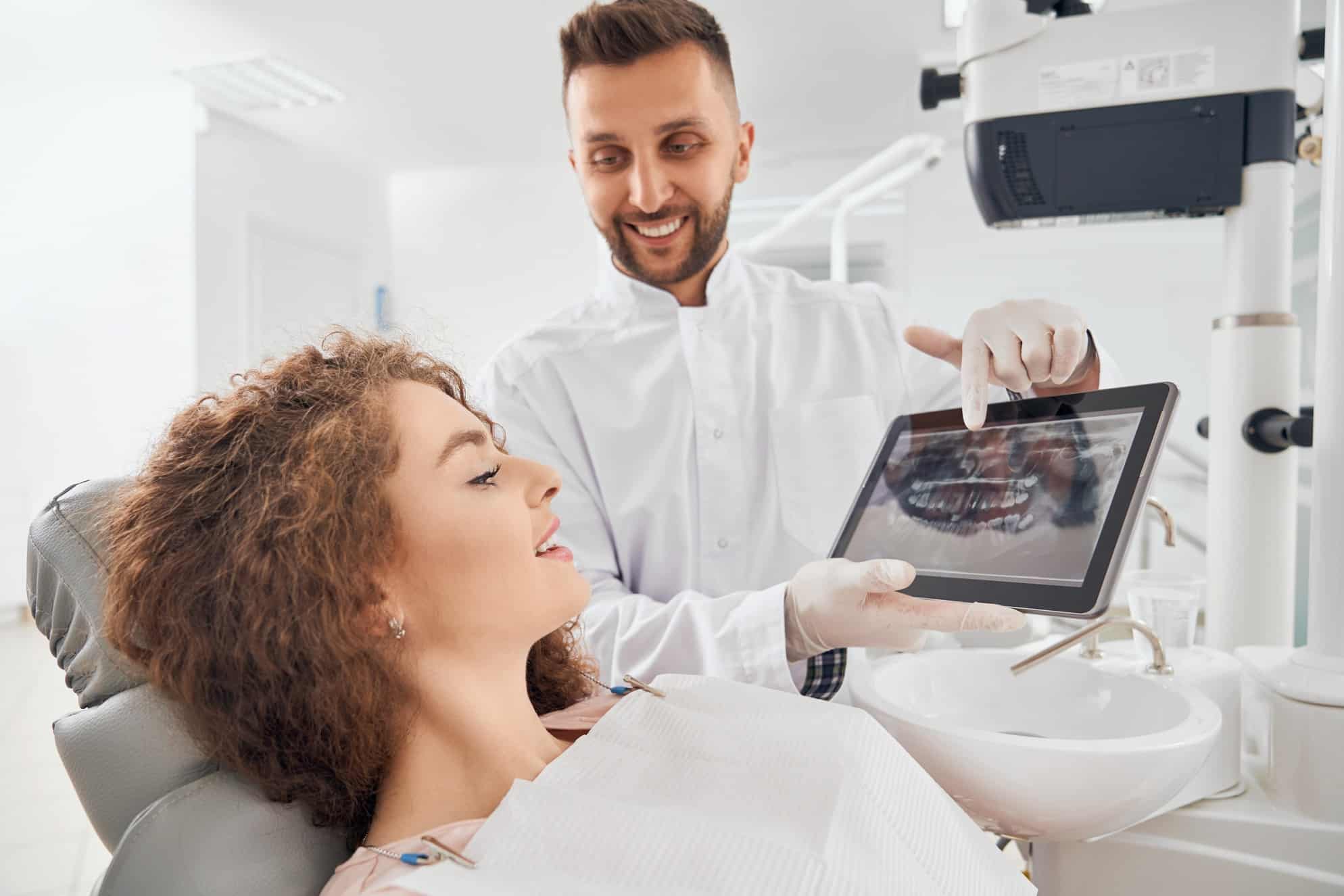 root canal dentist with a patient