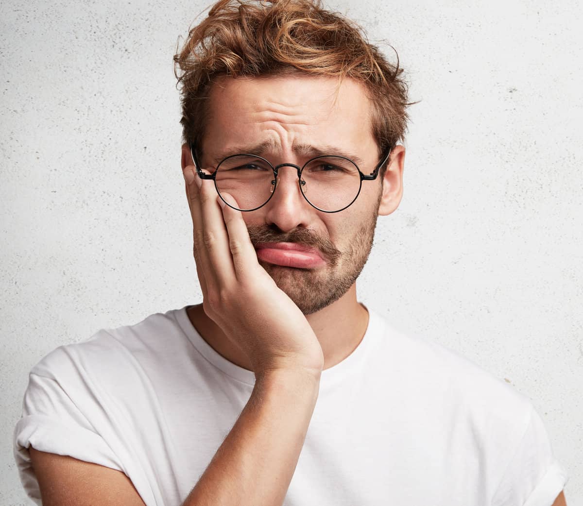 man with tooth pain