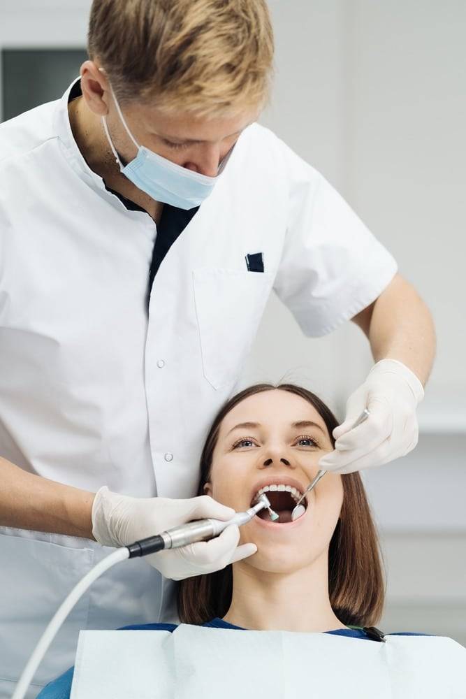 dentist treating cavities