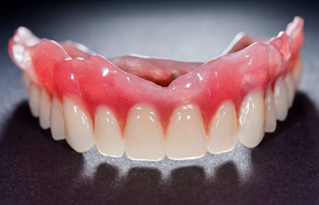 Home 32 denture web
