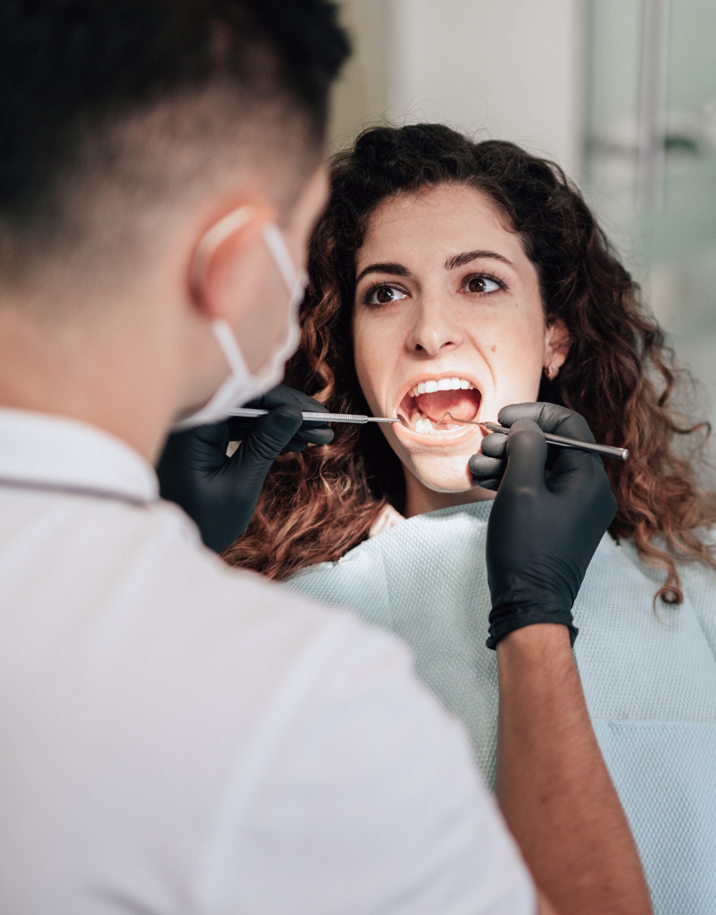 patient dentist office having dental check-up
